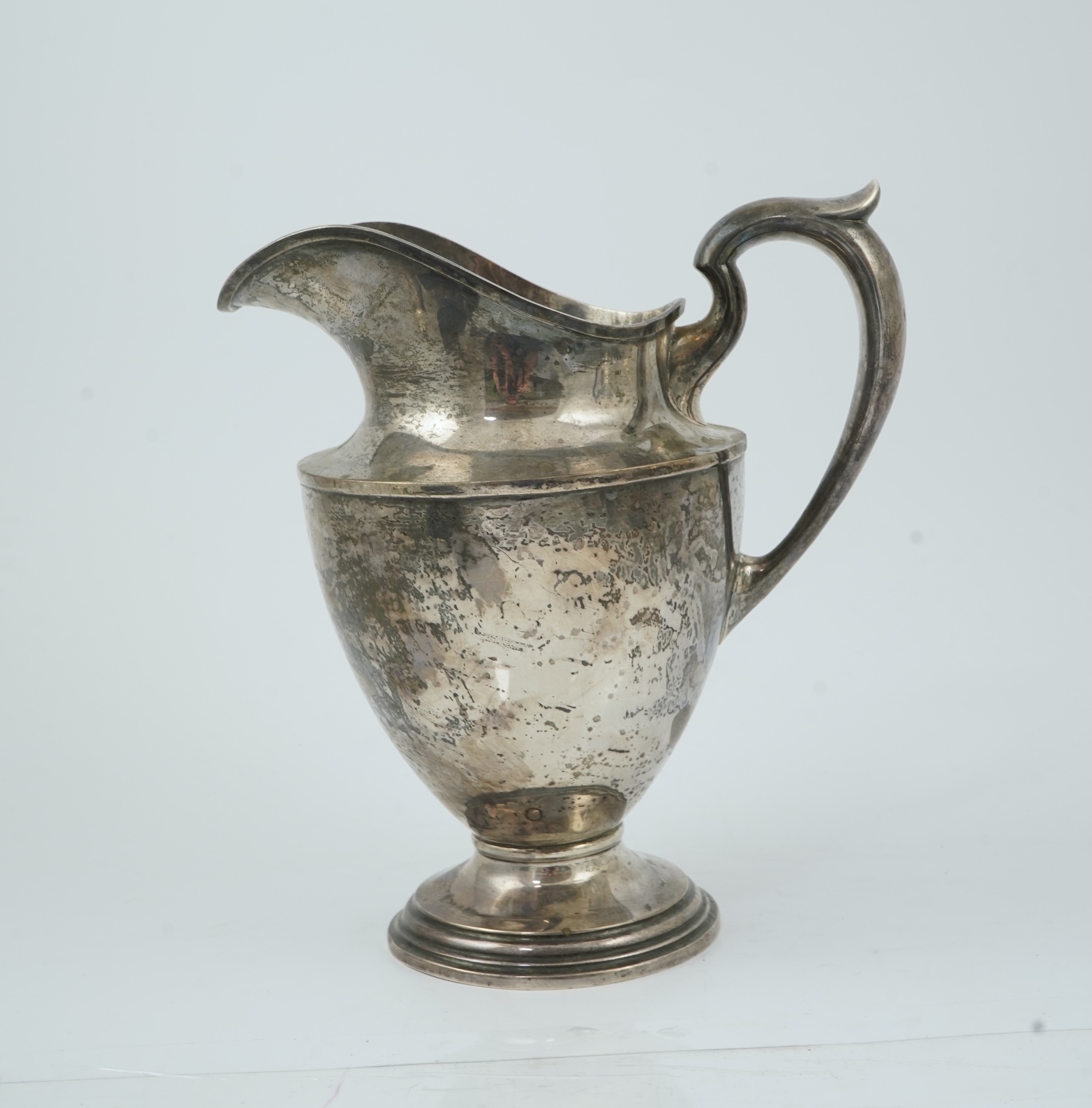 An early 20th century North American sterling silver large jug by Schofield & Co